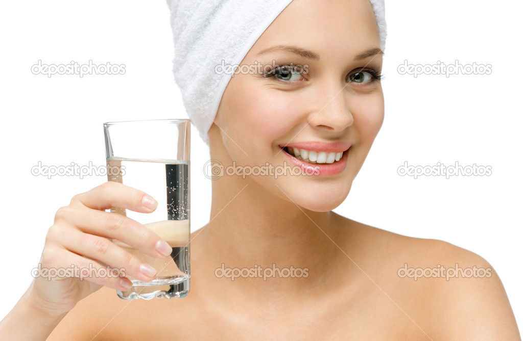 Girl keeps glass of water