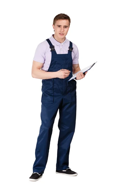 Deliveryman writing on a tablet — Stock Photo, Image