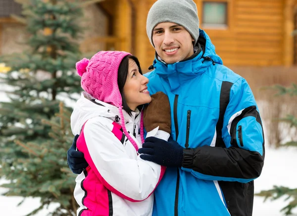 Half-length portrait of happy embracing couple — Stock Photo, Image