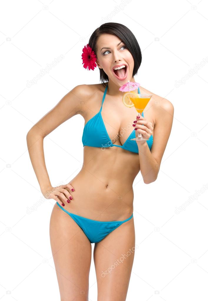 Girl wearing bikini keeps cocktail