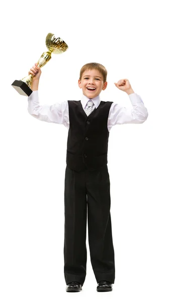 Full-length portrait of little businessman with gold cup — Stock Photo, Image