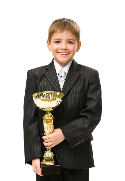 Pequeño hombre de negocios con copa de oro —  Fotos de Stock