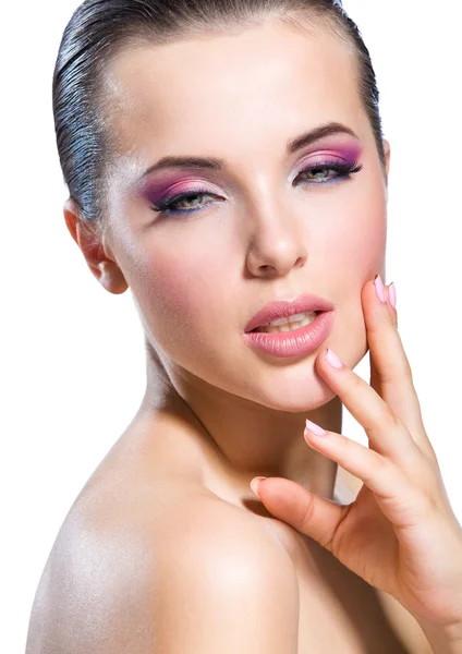 Touching face nude girl with brilliant pink make-up — Stock Photo, Image