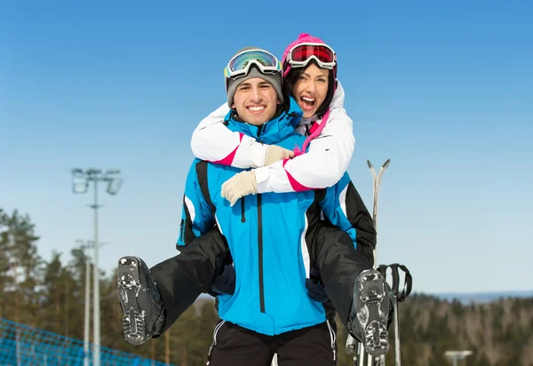 Happy couple of skiers have fun — Stock Photo, Image