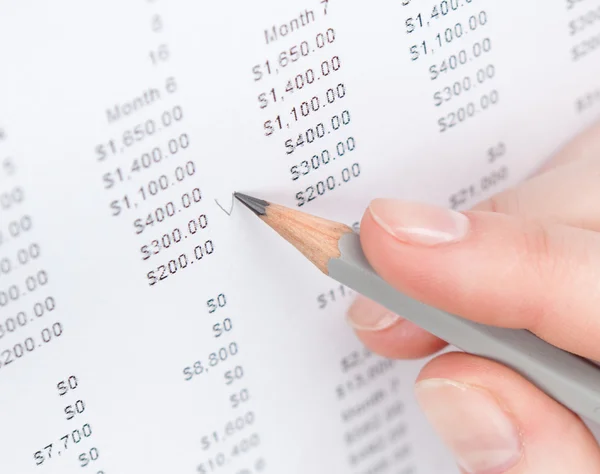 Close up shot of hand making notes in the document — Stock Photo, Image