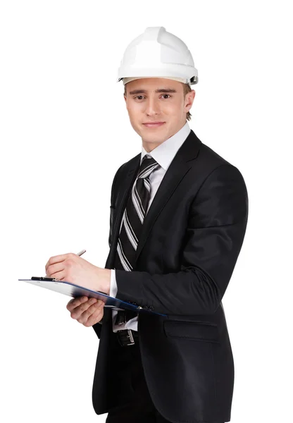 Constructor masculino en casco con papeles — Foto de Stock