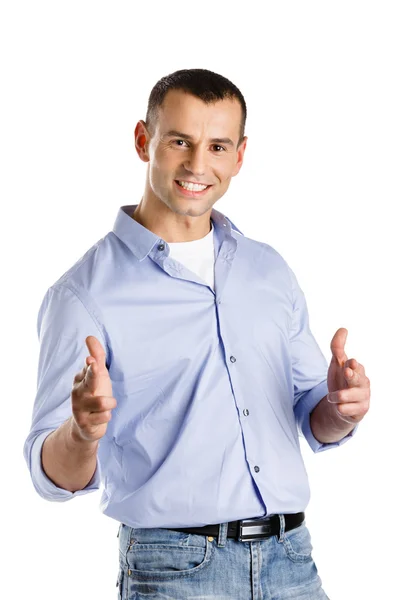 Young man shows hand guns gesture — Stock Photo, Image