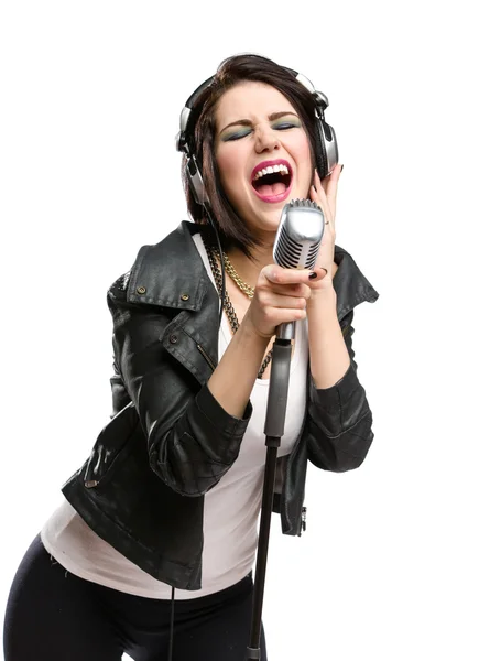 Rock singer with microphone and earphones — Stock Photo, Image