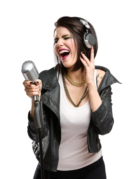 Rock singer with mic and earphones — Stock Photo, Image