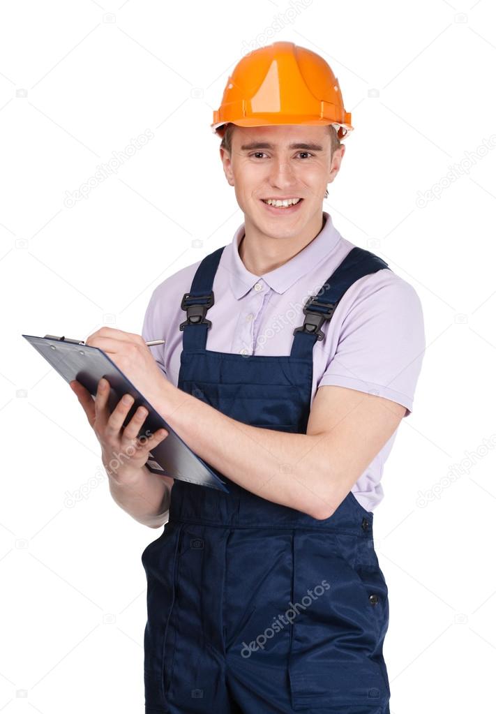 Contractor writing on a tablet