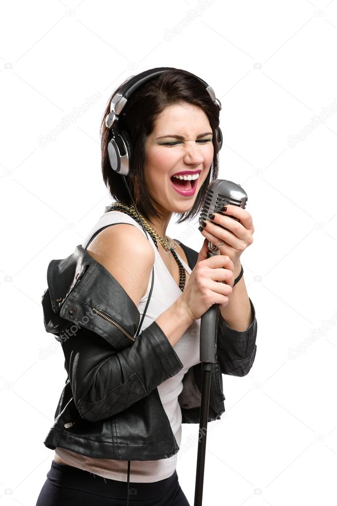 Rock singer with mic and headphones