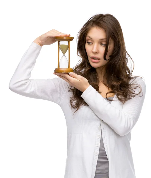 Portrait of woman handing hourglass — Stock Photo, Image