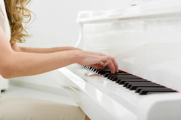 Closeup of hands playing piano — Stock Photo, Image