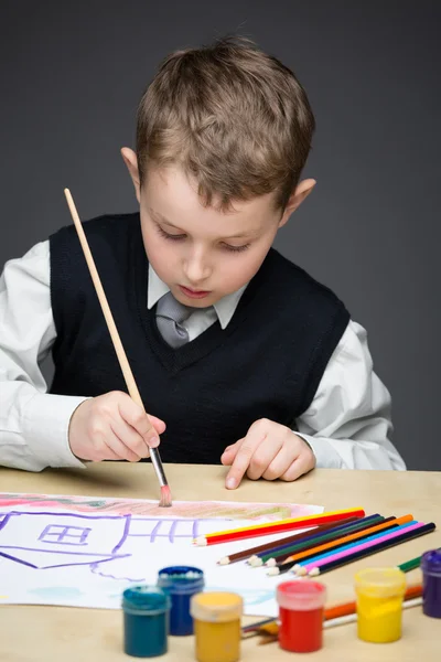 Little boy painting something — Stock Photo, Image