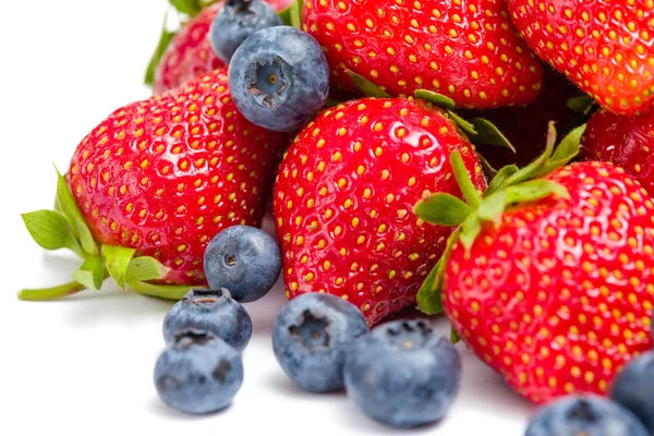 Close up shot of heap of strawberry and bilberry — Stock Photo, Image