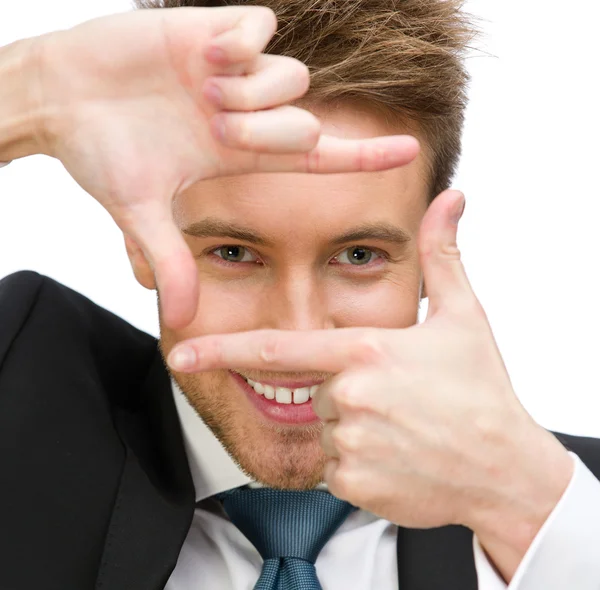 Portrait of business man frame gesturing — Stock Photo, Image