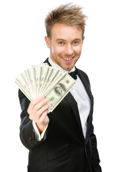 Businessman handing cash — Stockfoto