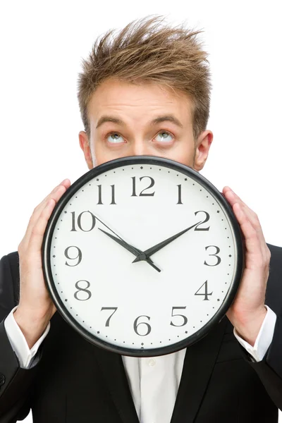 Businessman keeping clock — Stock Photo, Image