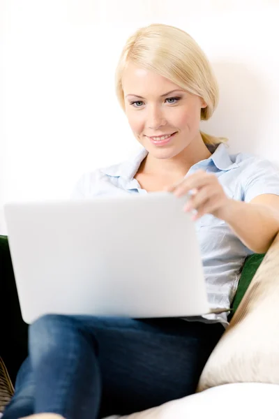 Woman sitting with computer — Stock Photo, Image