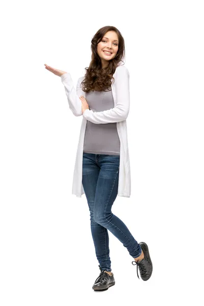 Full-length portrait of woman with palm up — Stock Photo, Image