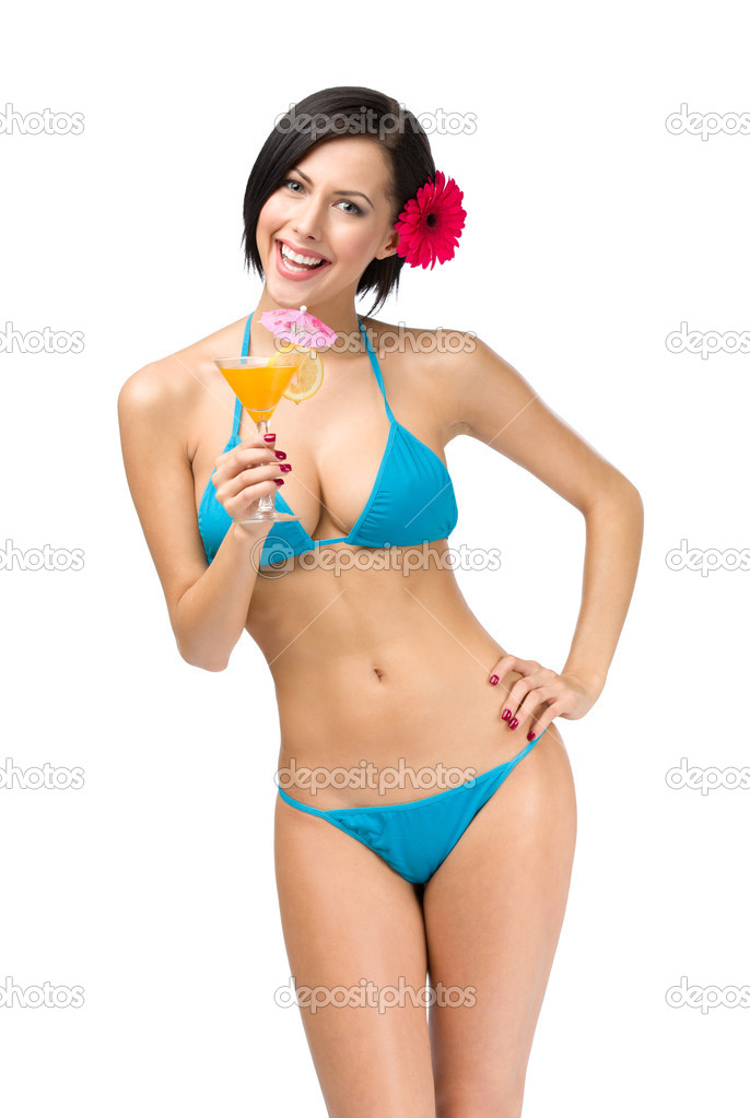 Female wearing bikini keeps cocktail