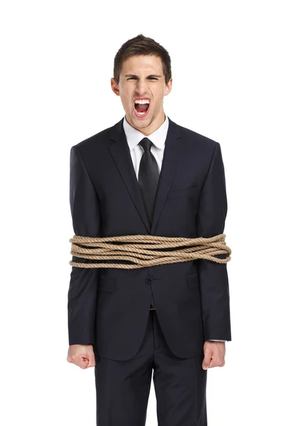 Screaming businessman tied with the rope — Stock Photo, Image
