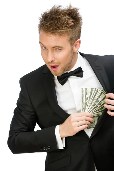 Businessman hiding cash — Stock Photo, Image