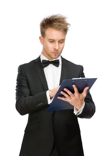 Businessman reading something in folder — Stock Photo, Image