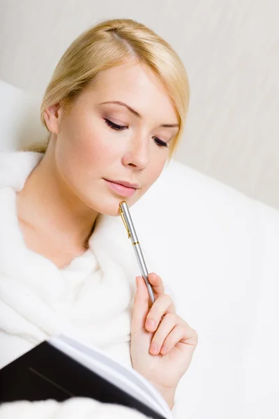 Woman keeps the book Stock Image