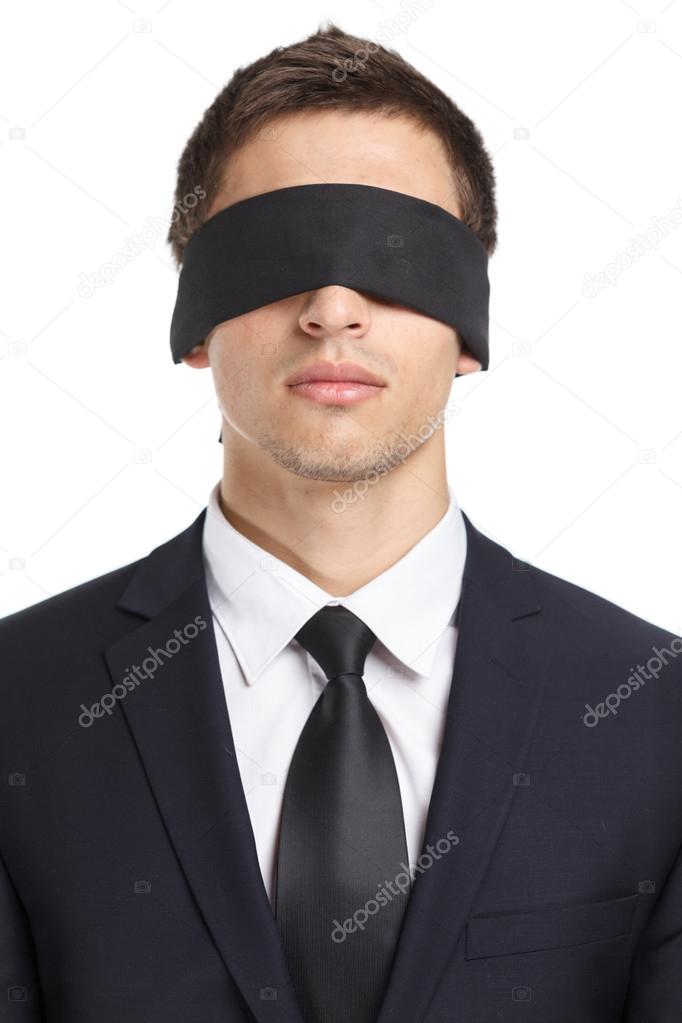 Blind-folded businessman