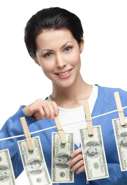Mujer cuelga dinero en la línea — Foto de Stock