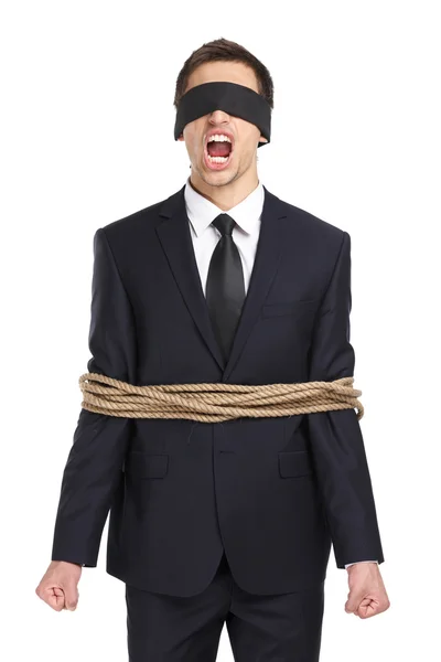 Empresário amarrado com a corda — Fotografia de Stock