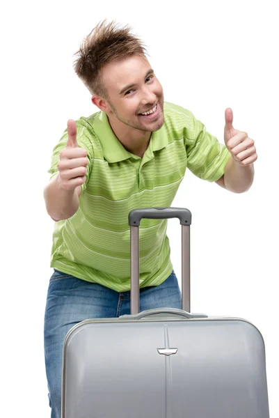 Man met reizen koffer duimschroef opwaarts — Stockfoto