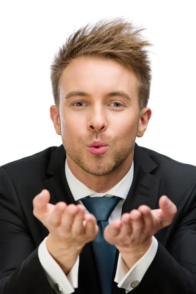 Businessman blowing kiss — Stock Photo, Image