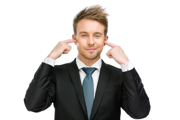 Man with closed ears — Stock Photo, Image