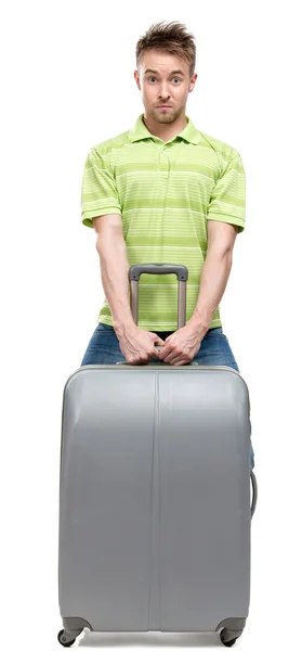 Man lifts silver luggage — Stock Photo, Image