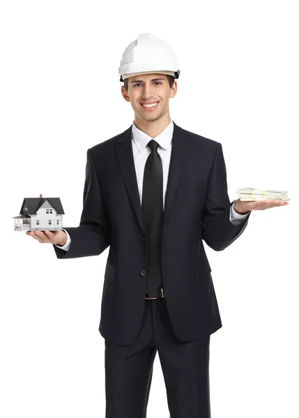 Real estate agent hands model house and money — Stock Photo, Image