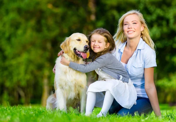Mother and daughter with pet Royalty Free Stock Images