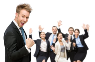 neşeli executivesbusiness takımının zaferi kutlayan grup