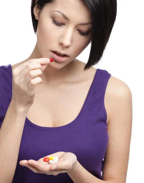Woman takes antibiotics — Stock Photo, Image