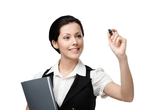 Young businesswoman writing on the invisible screen — Stock Photo, Image