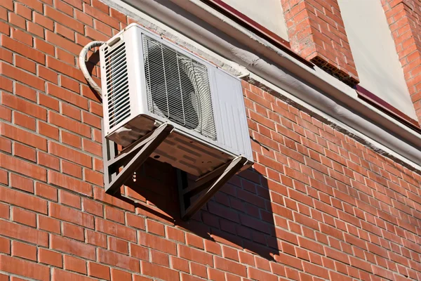 Cooler (conditioner) on red brick wall, modern industry. — Stock Photo, Image