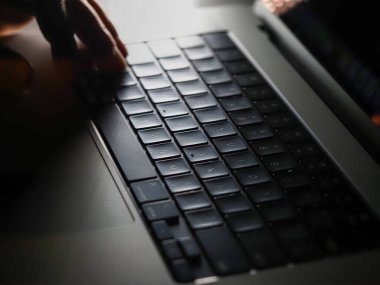 Belarus,Minsk,2022.macbook pro 16 close up new laptop keyboard close up