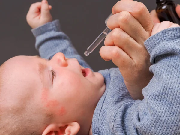 Parent Pipetting Cbd Oil Baby Mouth — Stock Photo, Image