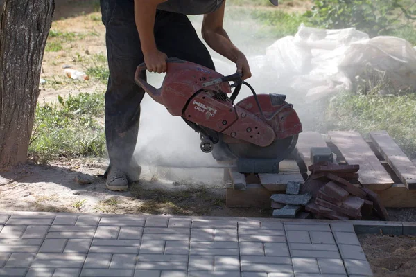 Construction Worker Cuts Concrete Tiles Bricks Power Cutter Belarus Minsk — Stock Photo, Image