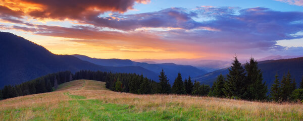 Panorama with a sunset in the mountains