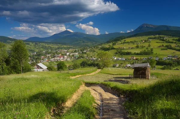 Road in the mountain village — Stock Photo, Image