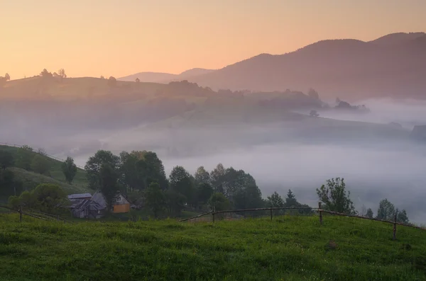 Dawn in a mountain village — Stock Photo, Image