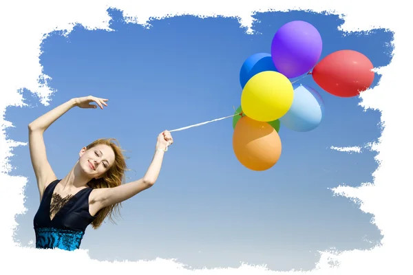 Redhead girl with colour balloons at blue sky background. — Stock Photo, Image