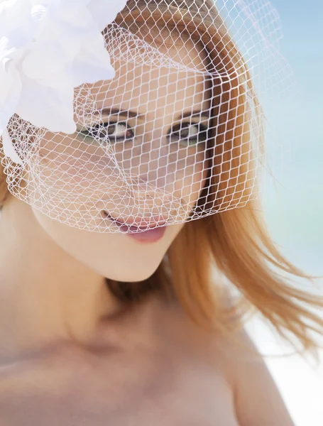 Young bride at the beach — Stock Photo, Image